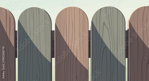 Five arched wooden fence pickets with varied grain and shadow