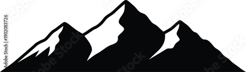 Dramatic mountain range silhouette under a twilight sky, a symbol of natural power and grandeur