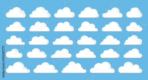 A collection of various white cartoon clouds against a clear blue sky background, illustrating different shapes and sizes.
