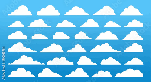 A collection of various white cartoon-style clouds against a vibrant blue sky background, showcasing different shapes and sizes.