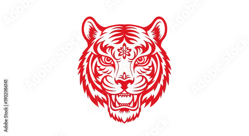 A fierce red tiger head illustration with a stylized floral symbol on its forehead, depicted in a bold, symmetrical design.