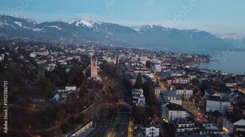 Aerial view of Vevey railway and Lake Geneva with Alps at dusk