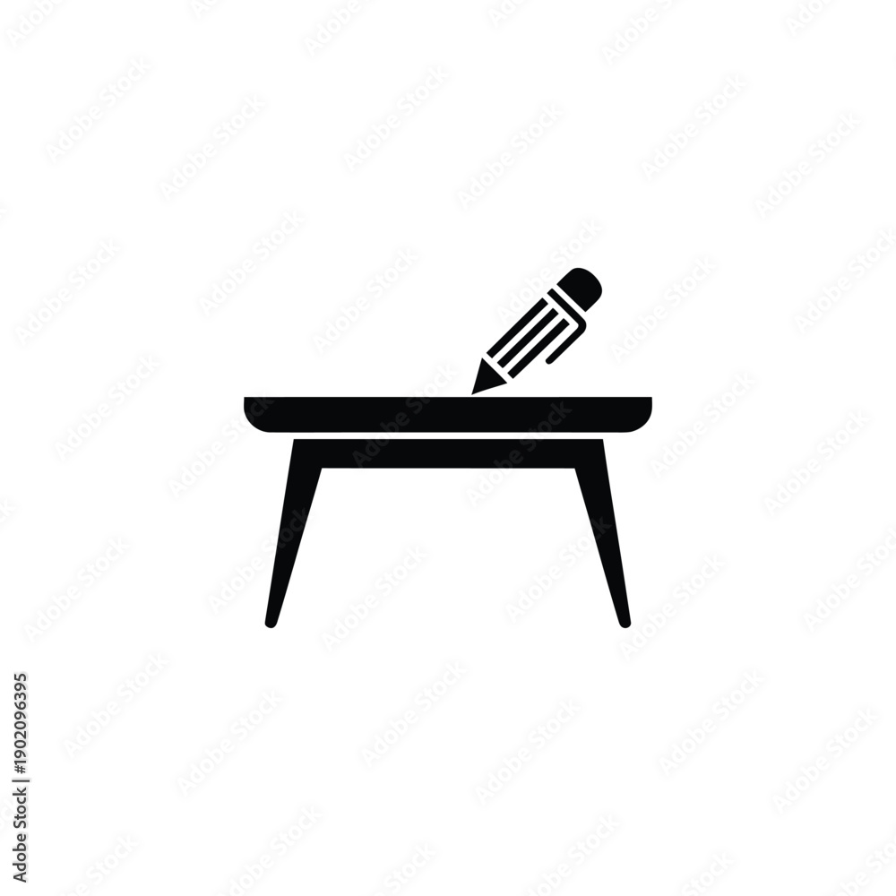 Fototapeta premium A black pencil lies on a simple table with tapered legs