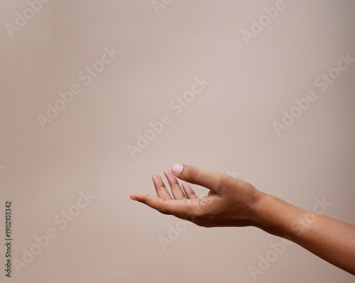 Tableau sur toile Sensitive hand gesture photographed against a soft background, conveying emotion