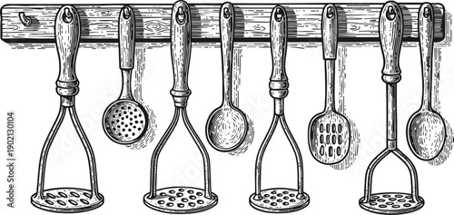 Vintage kitchen utensils set hanging on wooden rack in rustic with mashers and spoons