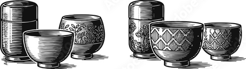 Traditional japanese tea cups and canisters set with intricate patterns in black and white vintage