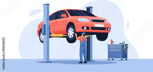 Mechanic servicing a car on a hydraulic lift in a repair shop