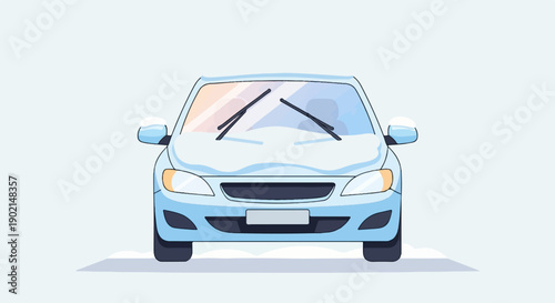 Light blue car covered in snow, front view, wipers active