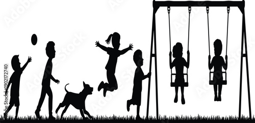 Silhouette of children playing with a dog and swinging on a playground in a park setting 1