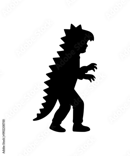 Child in dinosaur costume playing with hands up silhouette