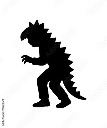 Child in dinosaur costume playing with hands up silhouette