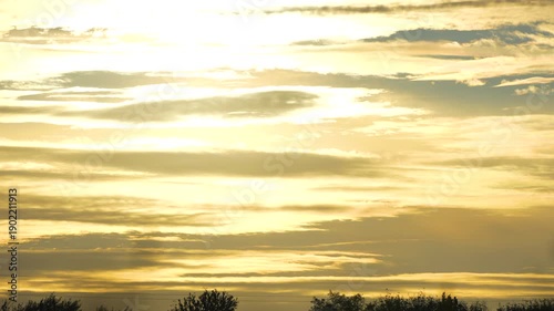 Wallpaper Mural time lapse of a sunset  over a field Torontodigital.ca
