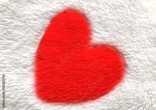 red heart on white furry background