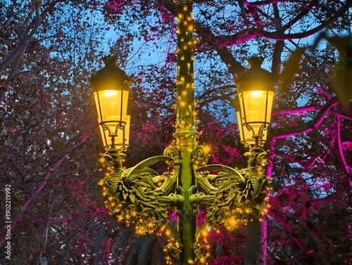 Obraz na płótnie Vintage light among vibrant blossoms, Decorative streetlamp illuminating floweri