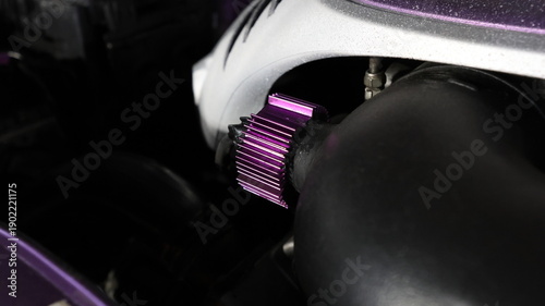 Wallpaper Mural Close up of purple anodized aluminum finned heat sink on car engine pipe Torontodigital.ca