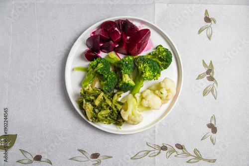 Seasonal salad at a tavern with broccoli cauliflower and beetroot