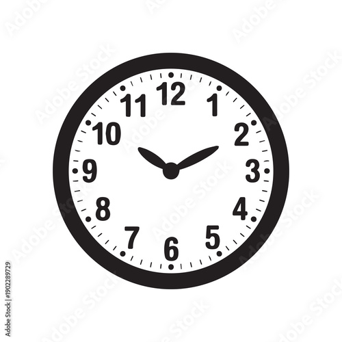 Black and white analog clock face displaying time with bold numerals and hands