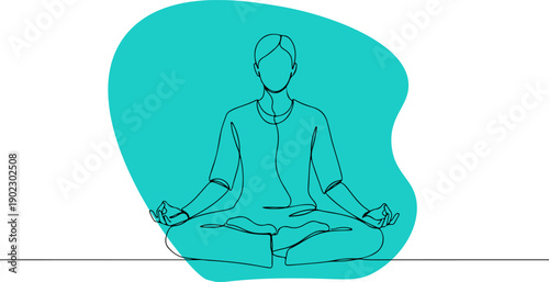 A person sitting in a meditative pose with a calm background.