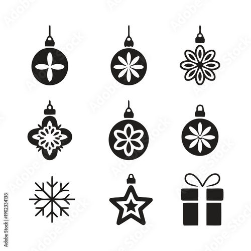 Nine Christmas ornaments and decorations including baubles snowflakes and gift box icons