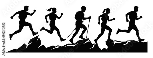 Group of active people silhouettes running and hiking across jagged rocks representing outdoor fitness endurance and mountain sports adventure