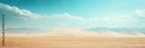Panel kuchenny z motywem Dramatic scene of a sand storm sweeping across a barren desert landscape wide banner - blue background