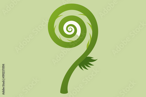 Green Fern Frond Unfurling in a Spiral nature
