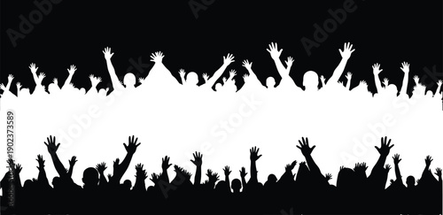 A crowd of people with their hands raised in the air, creating a sense of excitement and energy.