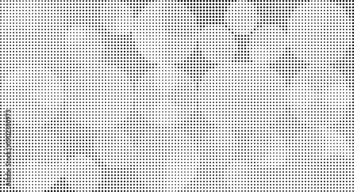 Black and white halftone pattern with varying dot sizes creating a textured background dots
