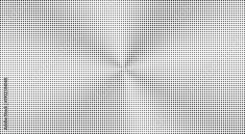 Black dots on white background with gradient density effect pattern texture