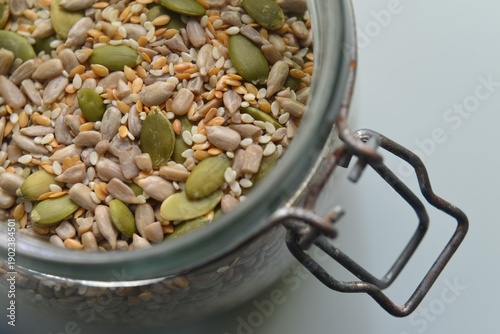 Mixed seeds in glass jar