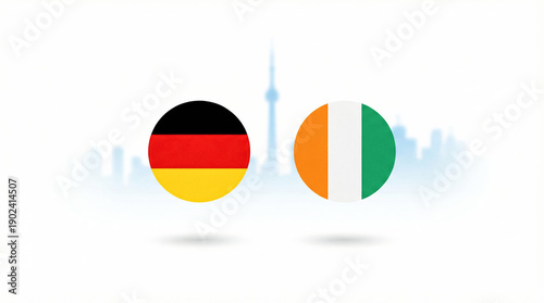 Free Download Two soccer balls with German and Ivorian flags displayed in Toronto, symbolizing an international football matchup. - GFXLoad