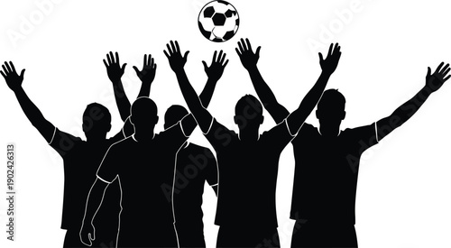 Silhouettes of soccer players jumping for ball in mid air