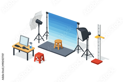 Professional photography studio setup with lighting, backdrop, and measuring tools