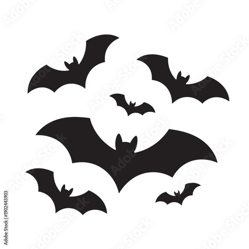 Black bat silhouettes flying in the sky 1