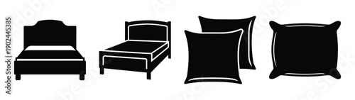 A minimalist vector graphic of a bed and pillows in silhouette mode