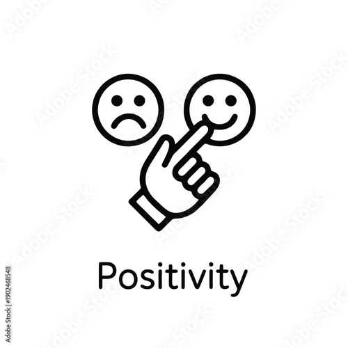 Choosing happiness a hand selects a smiling face over a frowning one