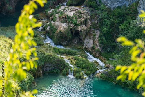 Fényképezés Plitvice Lakes, Croatia - August 16, 2025: Scenic landscape of turquoise lakes and waterfalls in National Park