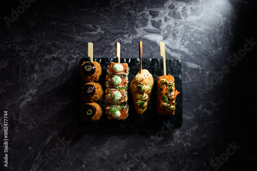 Gourmet Japanese fusion skewers with crispy fried toppings