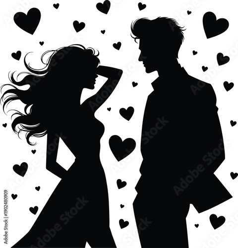 Silhouette of a romantic young couple standing apart facing each other surrounded by numerous small floating hearts for Valentines day and love concept.