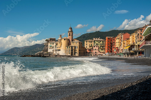 coast of the Italian fishing town of Camogli, colorful houses and fortress