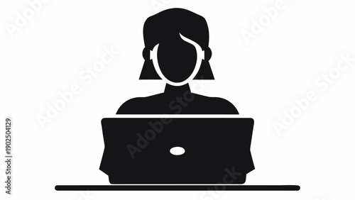 Woman working on laptop in modern workspace setting