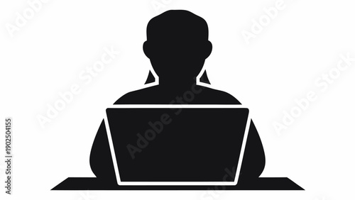 Businesswoman working on laptop in modern workspace setting