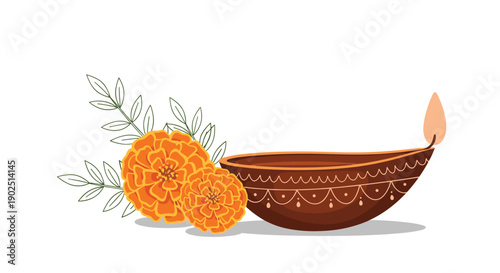 Traditional clay diya lamp with a glowing flame next to bright orange marigold flowers, symbolizing the festival of lights.