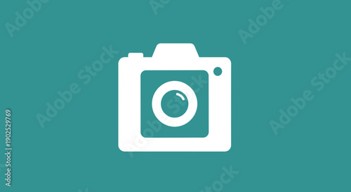 Simple White Camera Icon on Teal Background.