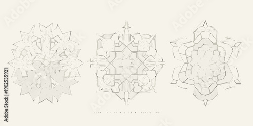 Three abstract geometric shapes resembling crystals or floral designs