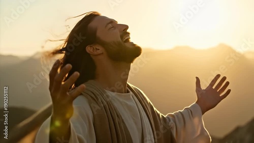 Jesus Christ, a man in white with outstretched hands on a mountaintop. The spiritual concept of praise and worship during sunrise or sunset. Religious piety.