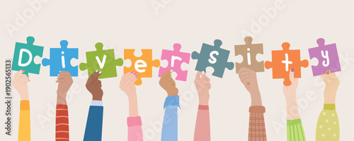 Diverse hands holding colorful puzzle pieces spelling diversity. Concept of inclusion, equality, multicultural teamwork and unity.