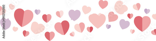 Valentine's Day themed flat lay with colorful heart patterns and roses on a white background, conveying a romantic and festive mood.