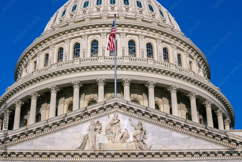 Fototapeta premium Detail of the United States Capitol building in Washington D.C., the meeting place for Congress and the seat of the legislative branch of the federal government.