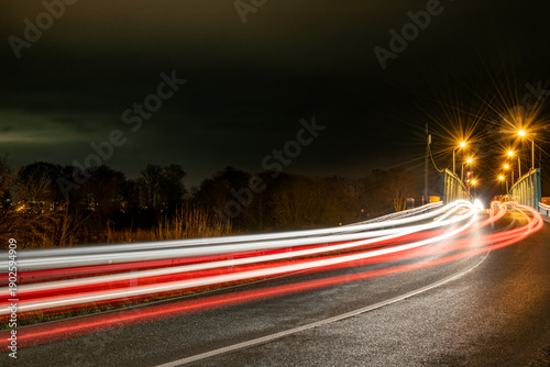 Light Trails of Cars on Bridge at Night Long Exposure